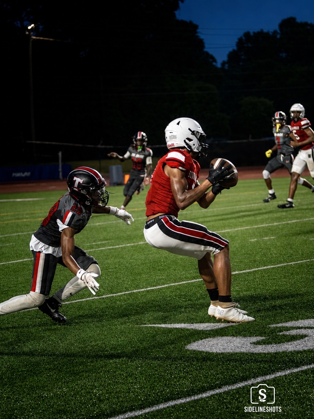 Stone Mountain receiver catching the ball